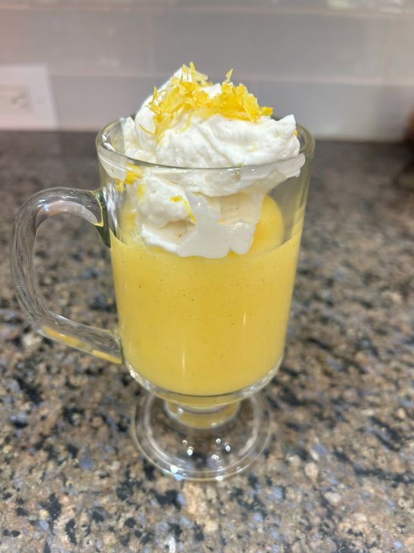Lemon pudding in a glass with frosting