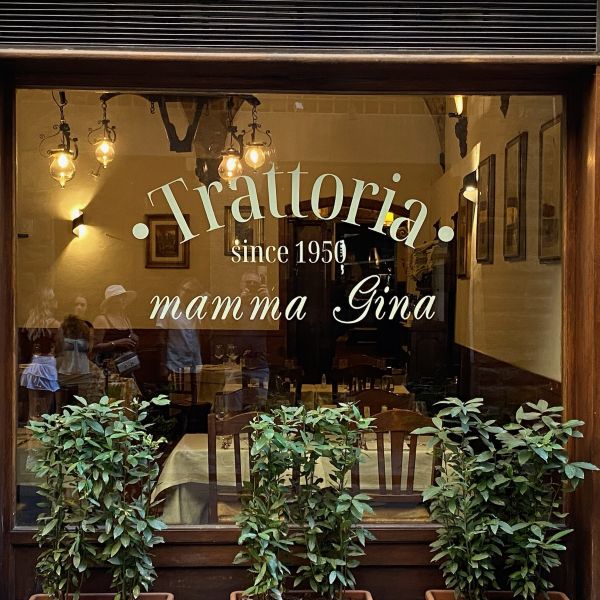 Window sign for Trattoria mamma Gina
