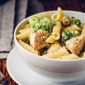 Creamy Tuscan Pasta with Chicken and Broccoli in a bowl